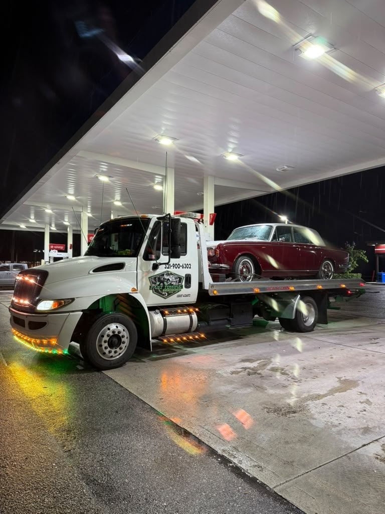 J&V flatbed tow truck in Poinciana FL